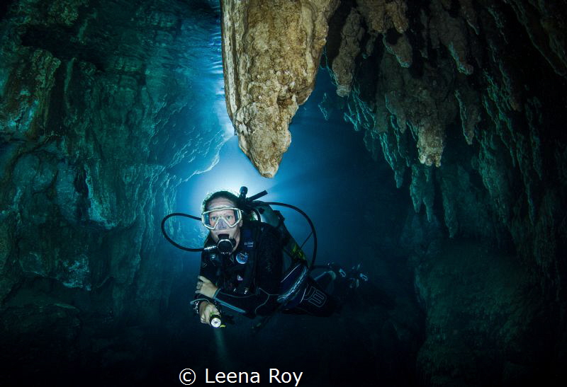 Diver in Chandelier cave by Leena Roy 