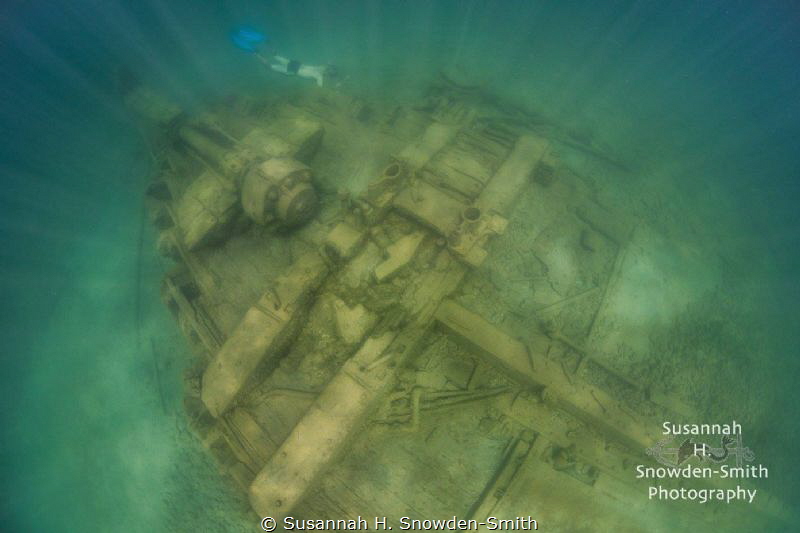 A free diver explores the stern of the Joseph S. Fay ship... by Susannah H. Snowden-Smith 