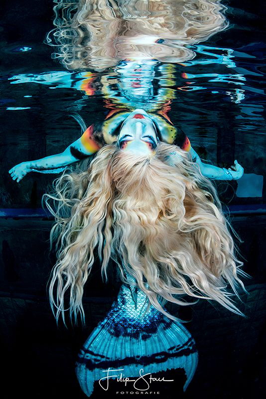 The world upside down. Photoshoot with mermaid Celine. by Filip Staes 