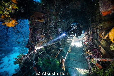 A diver in plane wreck "Kawanishi H8K - Type2 Flying Boat... by Atsushi Hori 