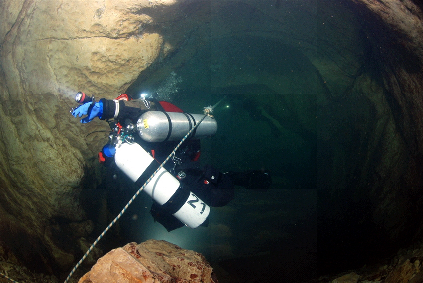 Diver in a french cave by Andy Kutsch 