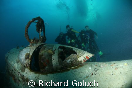 Group of divers posing with Betty Bomber-Truk Laggon by Richard Goluch 