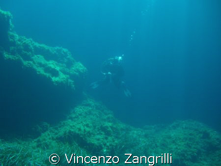 Divers raising from the blue.

Ustica Island, Sicily, I... by Vincenzo Zangrilli 