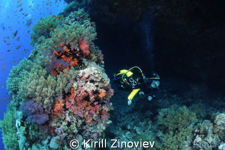 Two divers leaving the cave by Kirill Zinoviev 