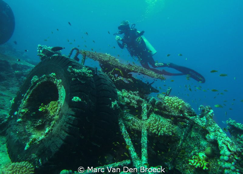 toyota wreck with Italian diver by Marc Van Den Broeck 