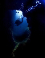 Descending through the chimney at Sail Rock, Gulf of Thailand 