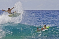 How to avoid running over attractive young surfer chicks.  Bonzai Pipeline, North Shore, Oahu. 