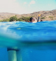 This is my friend Yutao while we were snorkeling at Electric Beach (Kahe Point).  There is some serious refraction here and he looks like 2 people. 