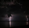 Late night on the beach, talking about past and future dives. Canon Rebel XT Digital, 18-55mm, approx 1 minute exposure on a mini tripod set on a beach front table.