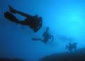 3 Divers in the cristal clear sea near Dubrovnik.