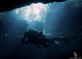 Diver Silhouetted at the entrance to Paradise Springs in Ocala, FL.