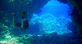 My dive buddy exiting the swim through cave systems at St Johns Caves in the Southern Egyptian Red Sea.