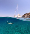 I took this shot this Summer at Aegina Island with a GoPro and Telesin Dome. I tryed a picture with 2 subjects a sailboat and a girl .
