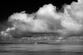 Gathering Storm. A sailboat in the Kwajalein Lagoon