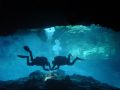 two caves divers putting the line for going in the caves,