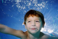 The Underwater Boy This portrait of my 4 yr. old was taken in my pool. I actually had to jump in out of my wheelchair to take it. Taken with a Nikonos III, 28 mm. lens, Ikelite DS 50 strobe with diffuser and Fuji Realla 100