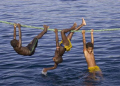 Joyful Youth.  Competition and playful opportunities abound when Bilikiki ties up at Anuha Village in the Russell group of the Solomon Islands.