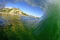 Inside out/barrel tube surfing...Salt Creek, CA, that's the Ritz Carlton (Dana Point) on the bluff.