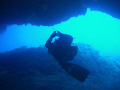 Diver getting into a canion in Ustica, Sicily, Italy