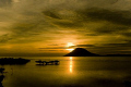 Sunset over Manado Tua. Pure Gold.