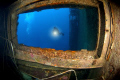Shot of a diver on the wreck of the Zenobia. Taken with a Nikon D100 & 10.5mm lens.