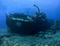 This is a wide angle shot of the Condesita a wreck off Tenerife it was shot in September 2009 using a 20d with one DS125 strobe the lens was a tokina 10-17. Depth is 17m in the early afternoon. This was our second dive of the day.