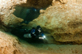 Cave diver in the Peanut Tunnel of Peacock Springs Cave System in North Central Florida.  Peacock is such a beautiful cave.  It floods in the winter when the rains arrive, but is crystal clear spring and summer.