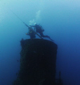 Divers beginning ascent from smoke stack, USS Duane, Key Largo, FL