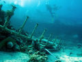 Divers on the wreck on the Abu Dabab reef in the southern Red Sea.