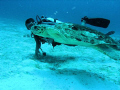 This turtle is huge.  The diver is swimming right next to him.  Beautiful