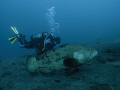 snapped this image of my buddy with a fair sized cod(?) at the USAT liberty, Tulamben. I am pretty sure i had a strobe 