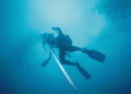 This photo of divers ascending the anchor line was taken with a Nikonos v and 15 mm lenses using ikelite strobe.  Off coast of North Carolina.