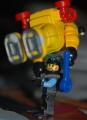 Lego diver prepares Playmobil diver for deep descent.