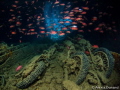 Underwater Pitstop. SS Thistlegorm, Red Sea, July 2013
Playing with shutter speed to get an impression of movement.

Taken with a Olympus E-PL1, Panasonic Lumix 8mm, Sea&Sea YS-D1 and YS-110a strobes. ISO125, f/13, 2sec.
