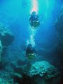 Scooter diving through the north shore canyons of Maui, Hawaii.