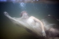 I captured this image of a bride during a drown the gown session beneath a 120 ft waterfall.  Being that its native land it made sense the image portrays a mystical feel. It is believed the spirits of the ancestors roam there.