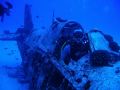 This is a 1942 Corsair that crash landed a half mile of the coast of Ohau Hawaii. It has rested here for 60 years and is in good condition. The photo was taken with a Nikon Coolpix 4600. My fist shoots underwater.