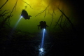 A dark reprieve from the storm. Carwash Cenote, Tulum, Mexico. Canon 7D, Tokina 10-17, Aquatica housing. Available light.