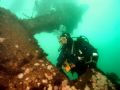 Diver on the Rondo.Sound of Mull,West Scotland.Taken with Olympus 5060+YS90 Strobe.The Rondo lies on a cliff slope with stern in 15m & bow in 50m